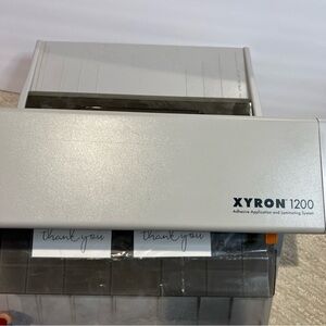 Xyron 1200 Adhesive Applicator & Laminating Sys-no power/heat needed-refill incl